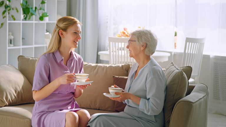 bigstock-Young-daughter-and-elderly-mot-427410026